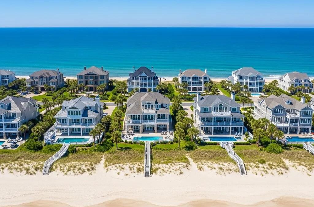 Aerial view of luxury beachfront properties in Atlantic Beach, showcasing oceanfront homes with pools and sandy beaches, emphasizing the desirable coastal real estate market.